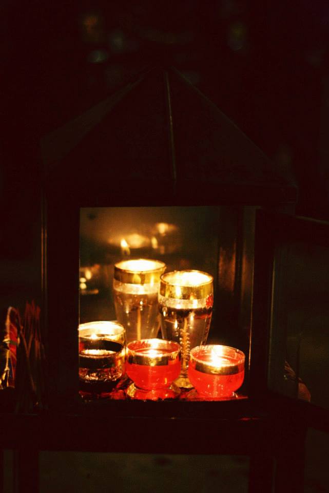 The cups of candle were protect by a small glass box. It is for prayer